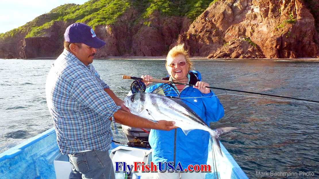 Harry Davis Sanchez and Patty Barnes with a roosterfish from the Sea of Cortez.